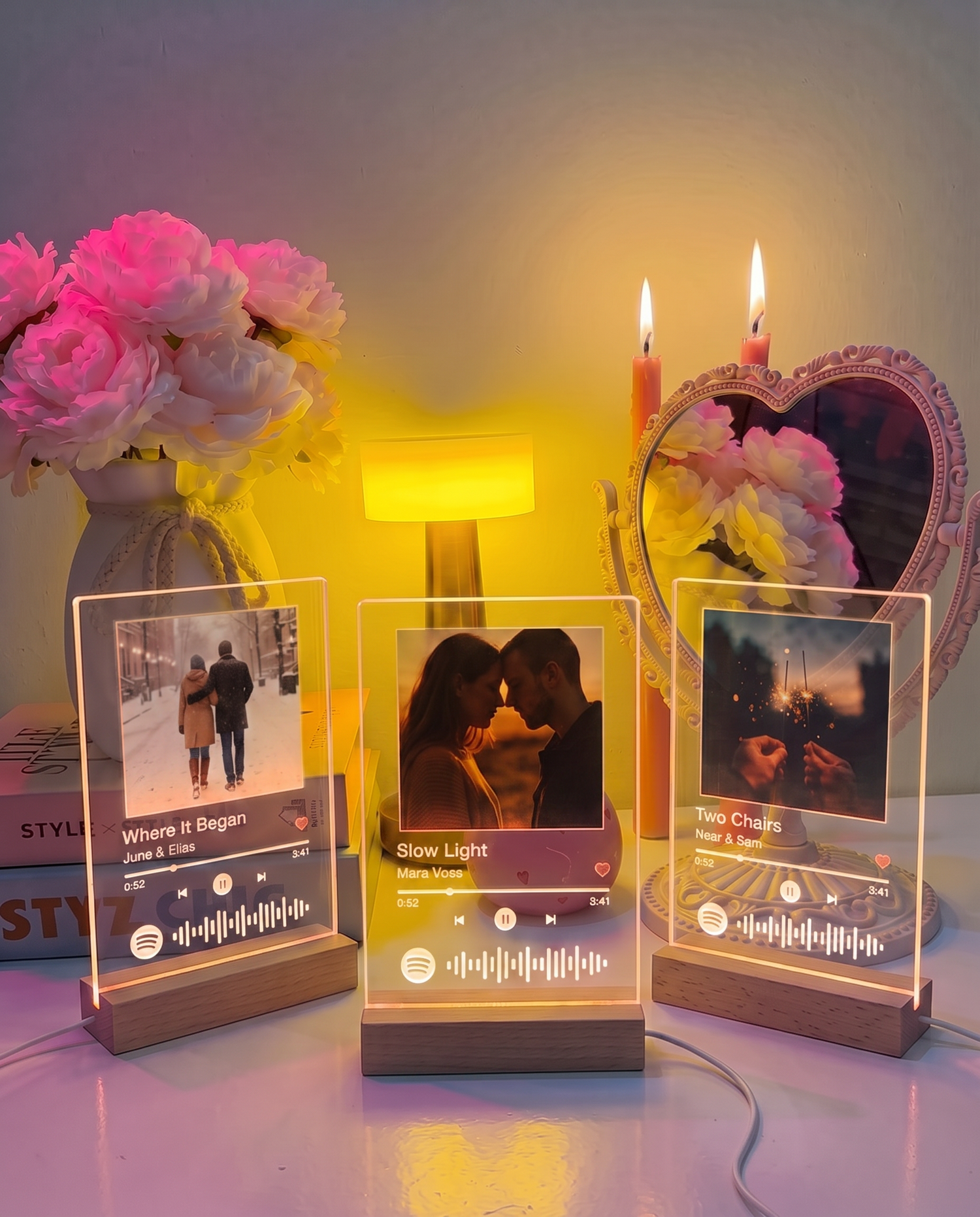 Three personalised Spotilight panels side by side, each with a different photo and a different song